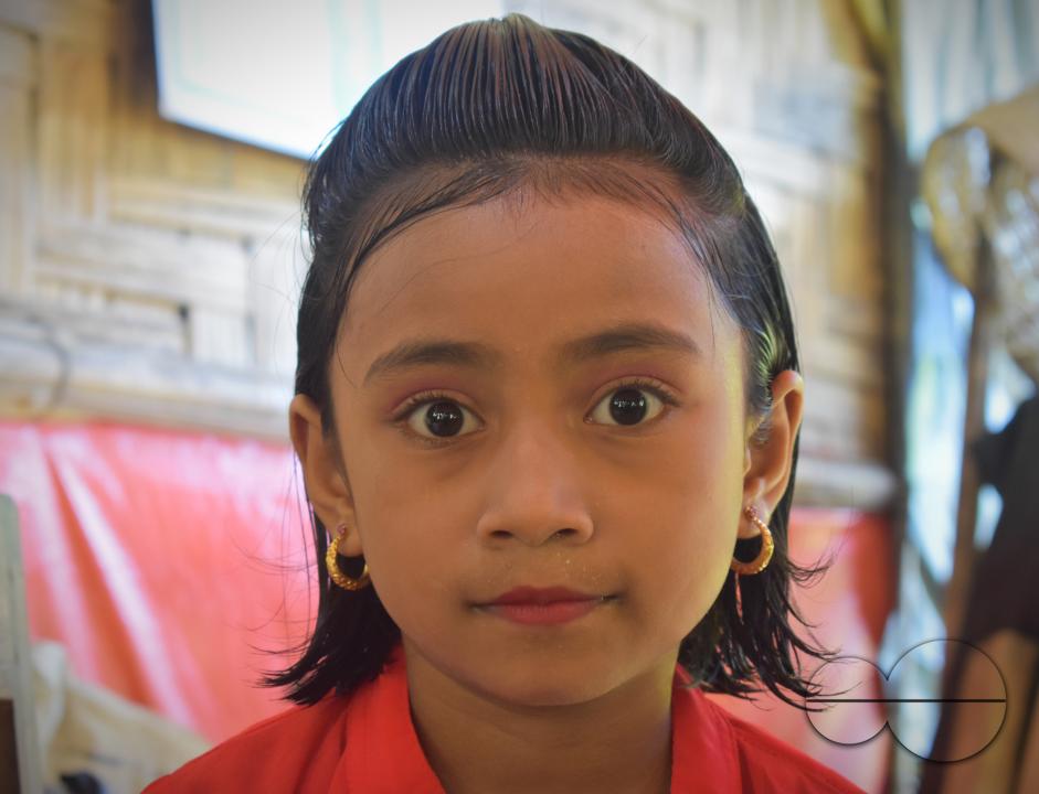 Portrait of a girl dressed for a concert at the Balukhali refugee camp