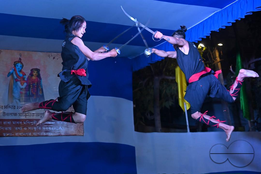 Manipuri martial arts students performing at the opening program of the 225th Raas Festival in Radha madhab Mandir at Agartala