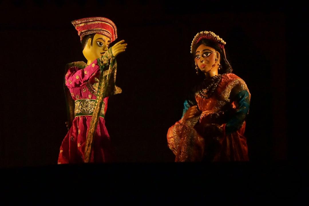 Puppeteers perform with puppets during the Tripura International Puppet Utsav 2024 organized by Tripura Puppet Theatre to celebrate 50 years of puppetry excellence