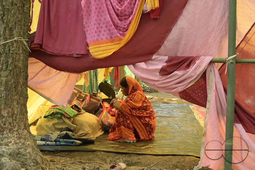 People in makeshift tents at Panisagar's reserve forest area