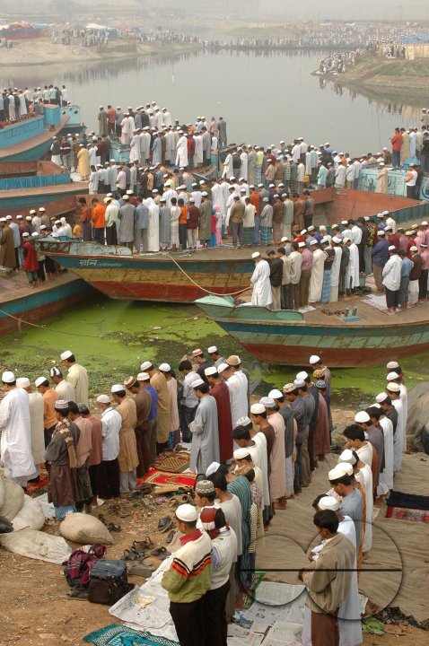 Pilgrims flow into the bank of Turag