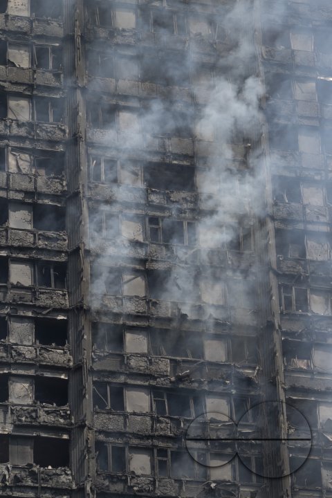 Fire brigade and community groups helping with fire disaster at  of Grenfell Tower in West London,UK