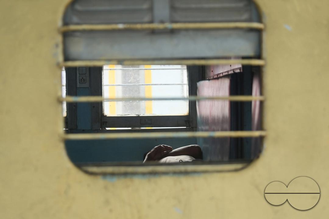 Passengers at the railway station waiting for the interstate train which got cancelled during Cyclone Remal in Agartala