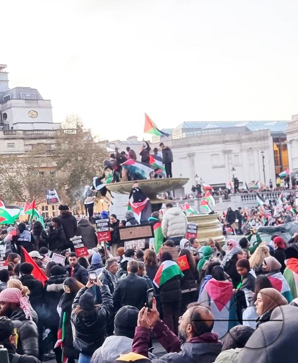 Thousands of protestors raise voices, carry placards and show their support for Palestinians, at Trafalgar Square, central London
