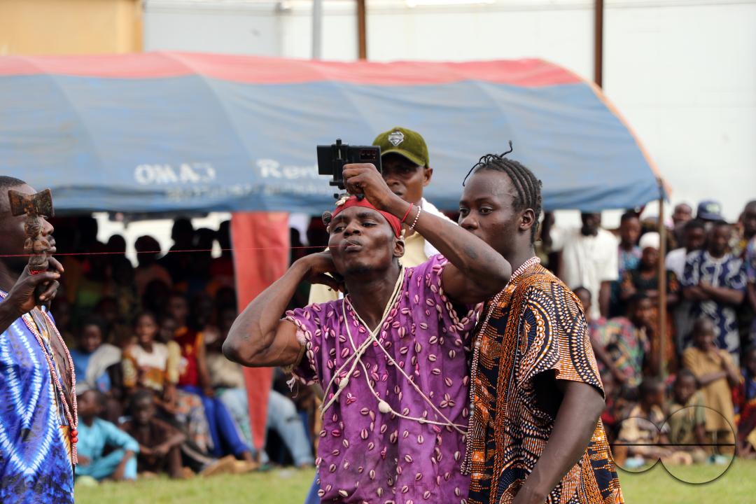 Sango worshiper performs at the World Sango Festival which is an annual festival held among the Yoruba people in honor of Sango, a thunder and fire deity who was a warrior and the third king of the Oyo Empire after succeeding Ajaka his elder brother