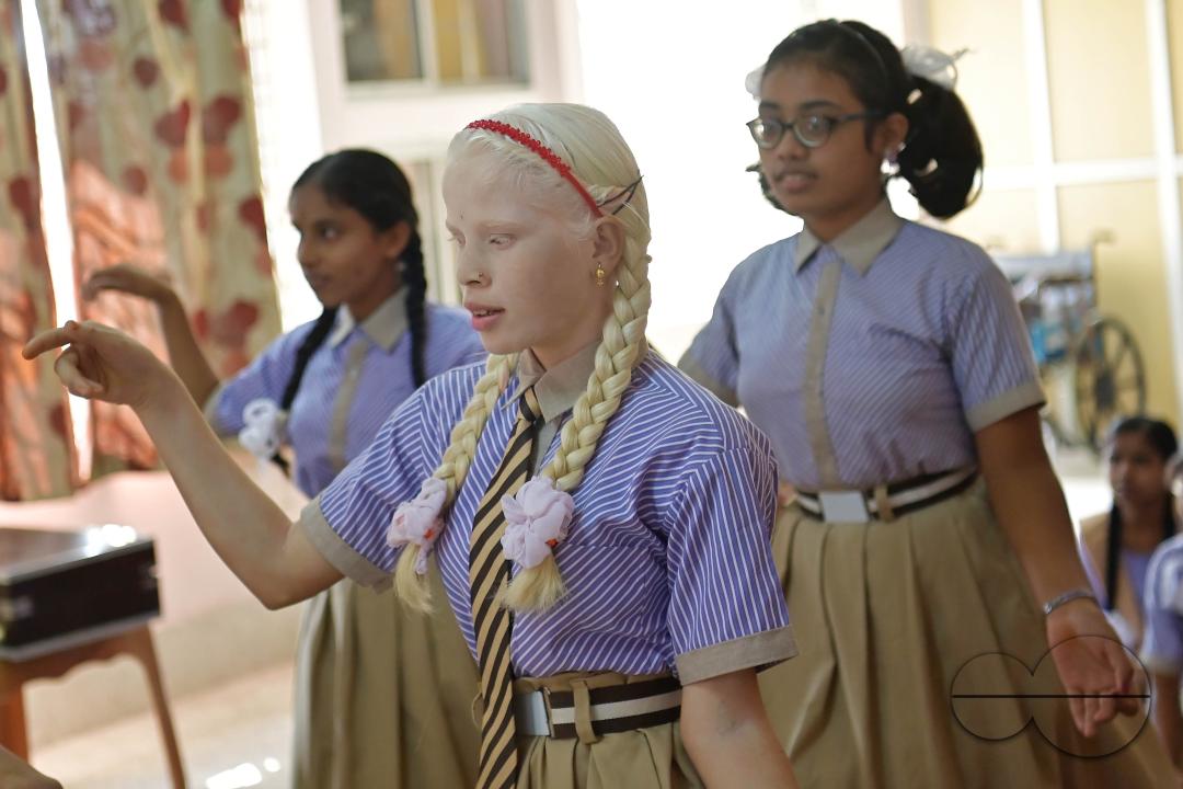 Students at the Institute for Visually Handicapped are performing a dance during the 'Children's Day' celebration at the institute's campus in Narsingarh, in Agartala
