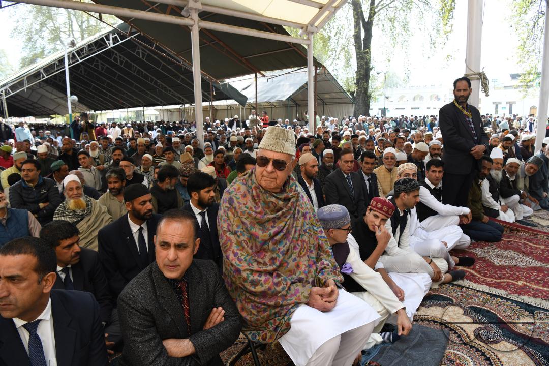 NC President Farooq Abdullah and his son Omar Abdullah offer eid prayers at Hazratbal Shrine in Srinagar
