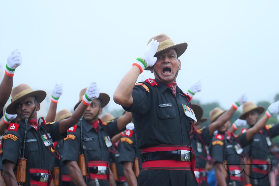 Soldiers of different platoons at the 77th Independence Day parade at the Assam Rifles ground in Agartala