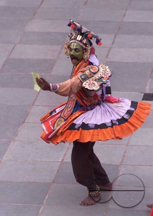 A South Indian dancer performs during a stage show at a dance festival in Kolkata, India