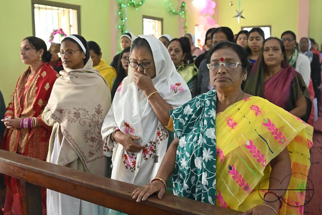 Christians attend a Christmas Mass in Mariam Nagar Church at Agartala