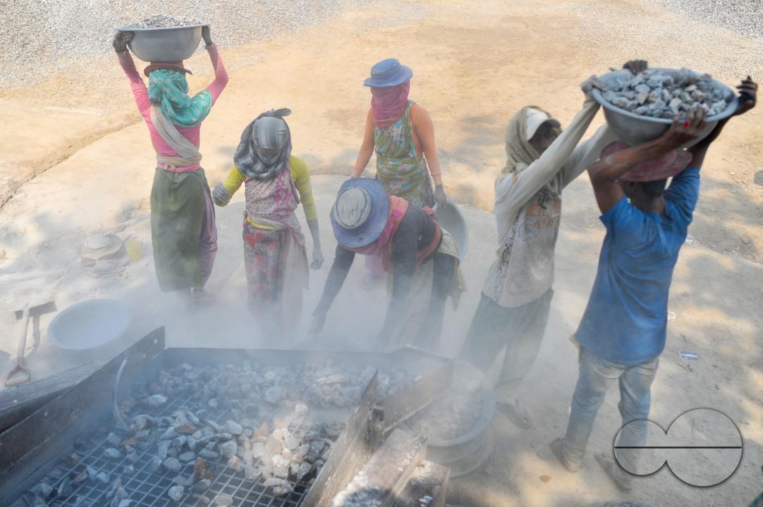 Male and female workers are breaking LC stones with a crusher machine in Bholaganj area, known as the 'Stone State' of Sylhet Companyganj Upazila