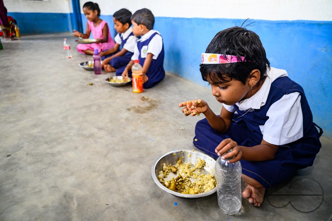 The mid-day meal scheme is a school meal program of the Government of India designed to better the nutritional standing of school-age children nationwide