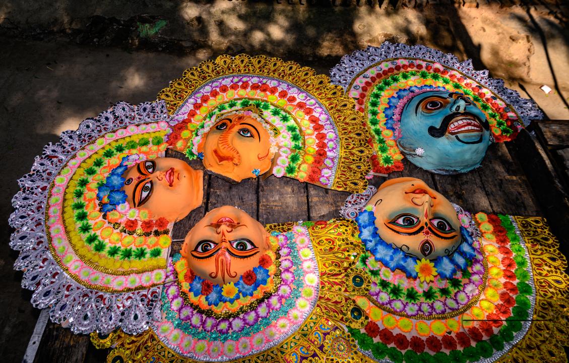 A village idol artist makes large color masks modeled after Purulia Chhau dance masks (Purulia Chhau dance is listed on UNESCO's World Heritage list of dances) of goddesses, animals, and rakshasas (humanoid demons or unrighteous spirits) like Hindu mytho