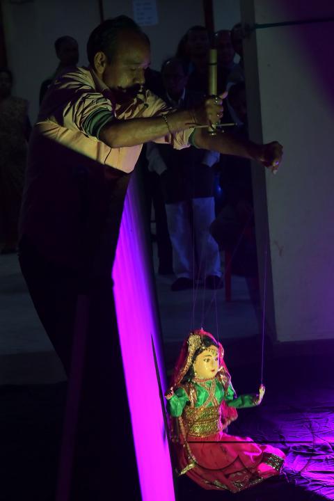 Puppeteers perform with puppets during the Tripura International Puppet Utsav 2024 organized by Tripura Puppet Theatre to celebrate 50 years of puppetry excellence