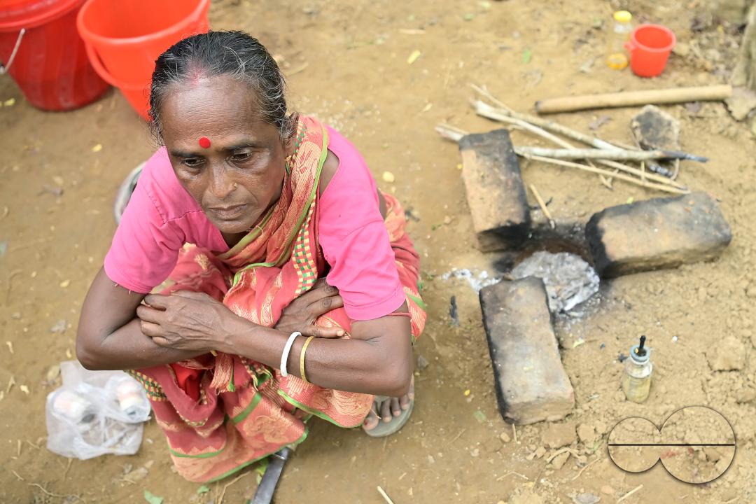 People in makeshift tents at Panisagar's reserve forest area