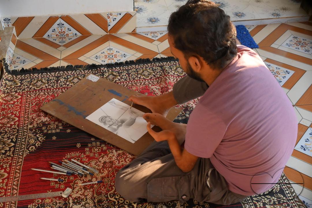 A 23-year-old differently abled artist Pralay Dey, is pursuing his bachelorâs degree in psychology from Tripura Central University