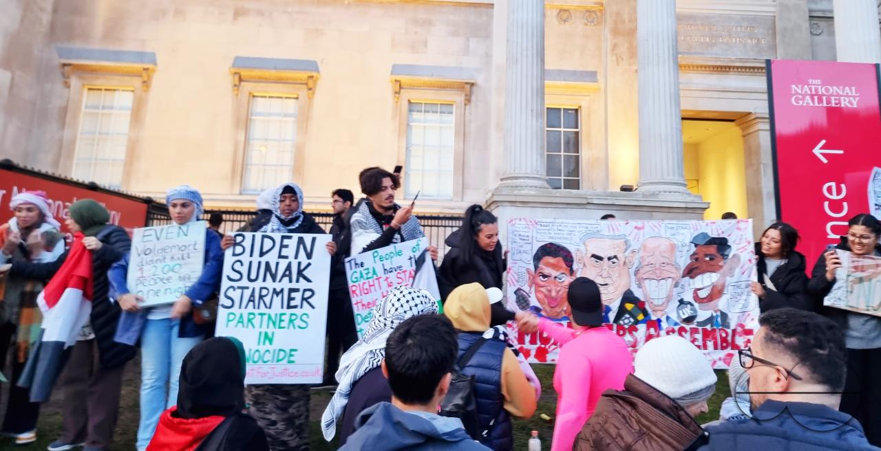 Thousands of protestors raise voices, carry placards and show their support for Palestinians, at Trafalgar Square, central London
