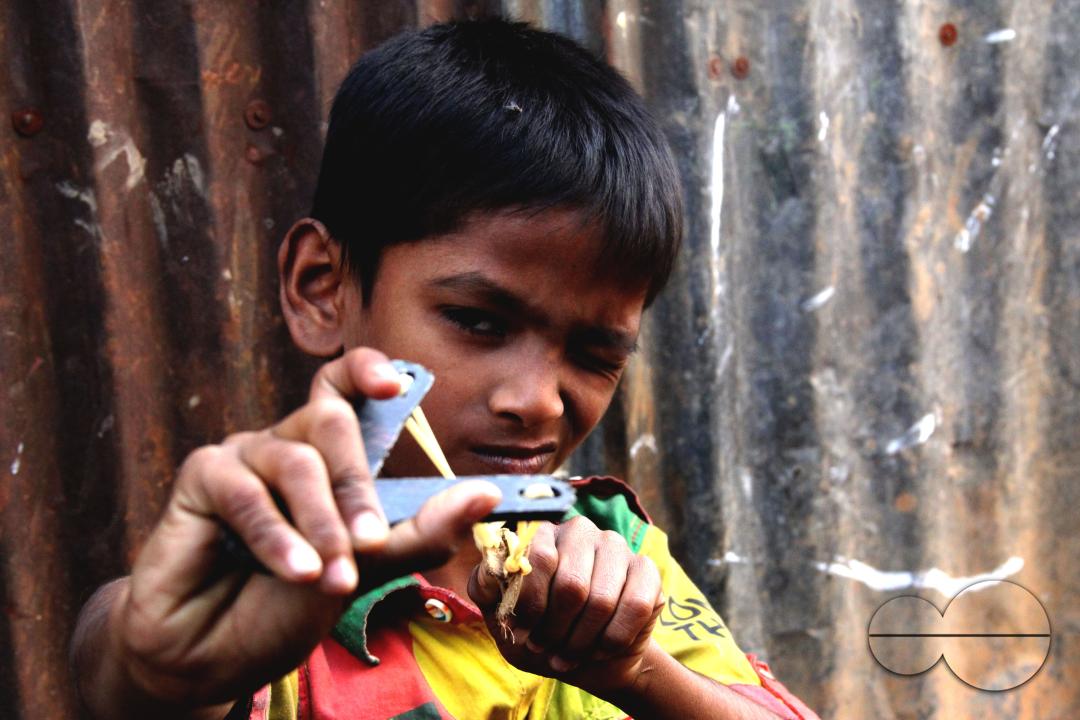 Portrait of a boy in the slums of Rayer bazar