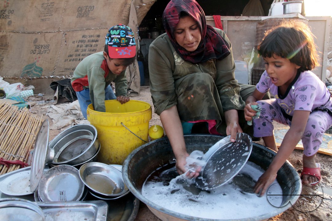 Photo story - Abu Mohammad and His family - the relationships between a poor family how they live.
