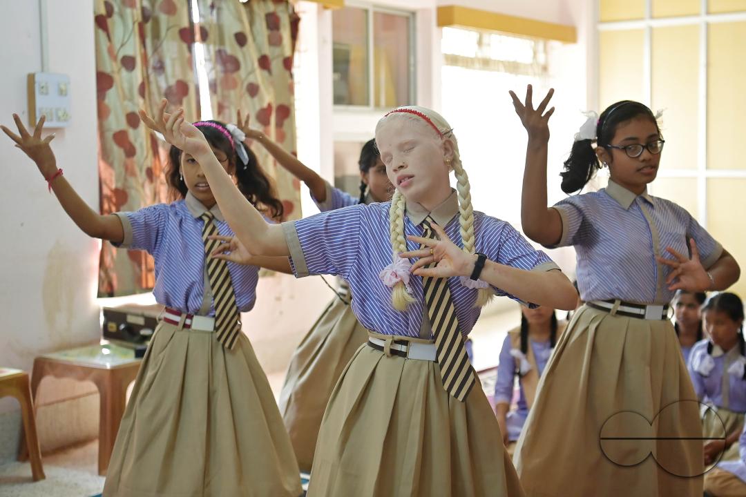 Students at the Institute for Visually Handicapped are performing a dance during the 'Children's Day' celebration at the institute's campus in Narsingarh, in Agartala
