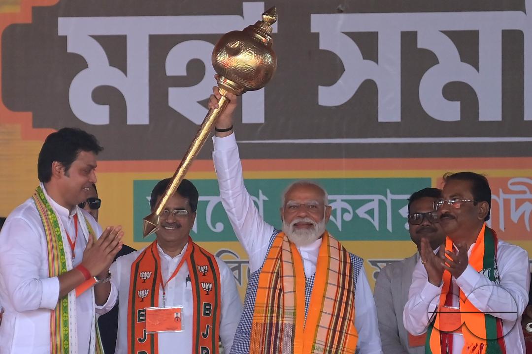 Prime Minister Narendra Modi is felicitated by Tripura Chief Minister Dr