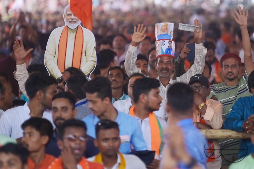 Supporters of the BJP at a rally of Prime Minister Narendra Modi ahead of the Lok Sabha Election in Agartala