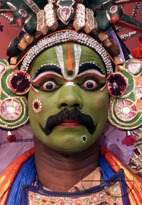 A South Indian dancer performs during a stage show at a dance festival in Kolkata, India