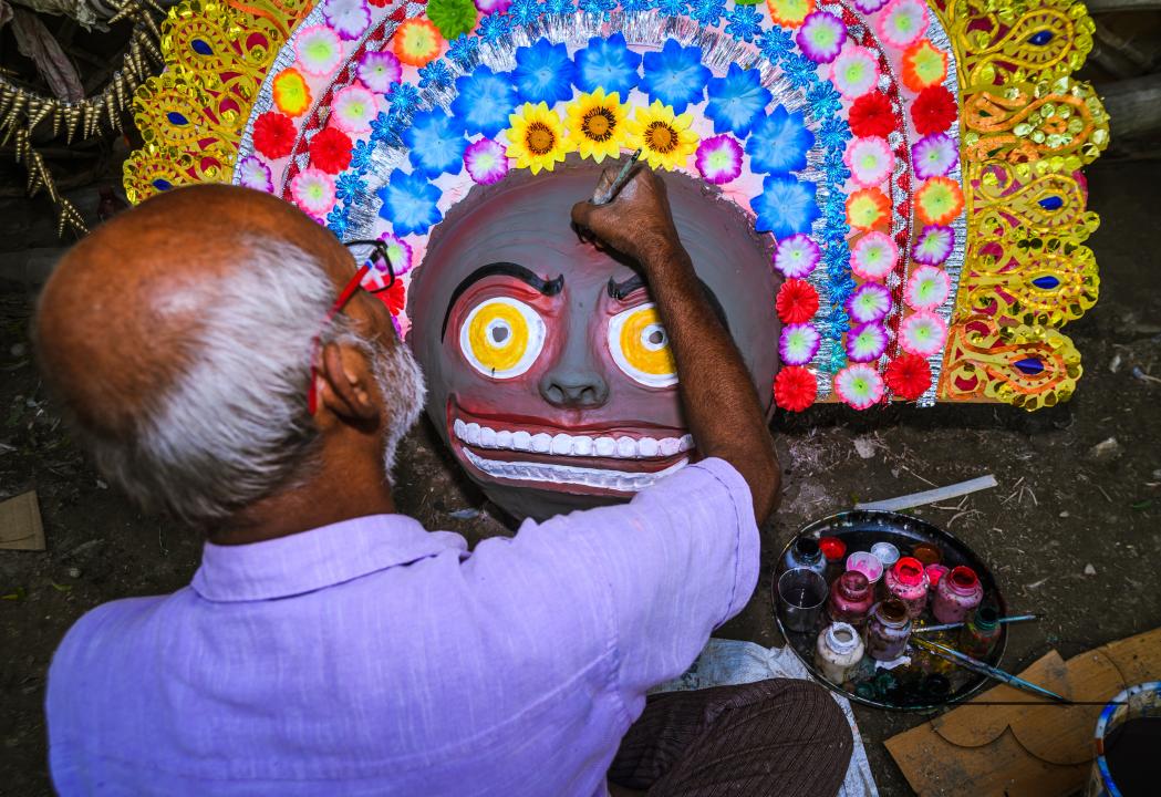 A village idol artist makes large color masks modeled after Purulia Chhau dance masks (Purulia Chhau dance is listed on UNESCO's World Heritage list of dances) of goddesses, animals, and rakshasas (humanoid demons or unrighteous spirits) like Hindu mytho