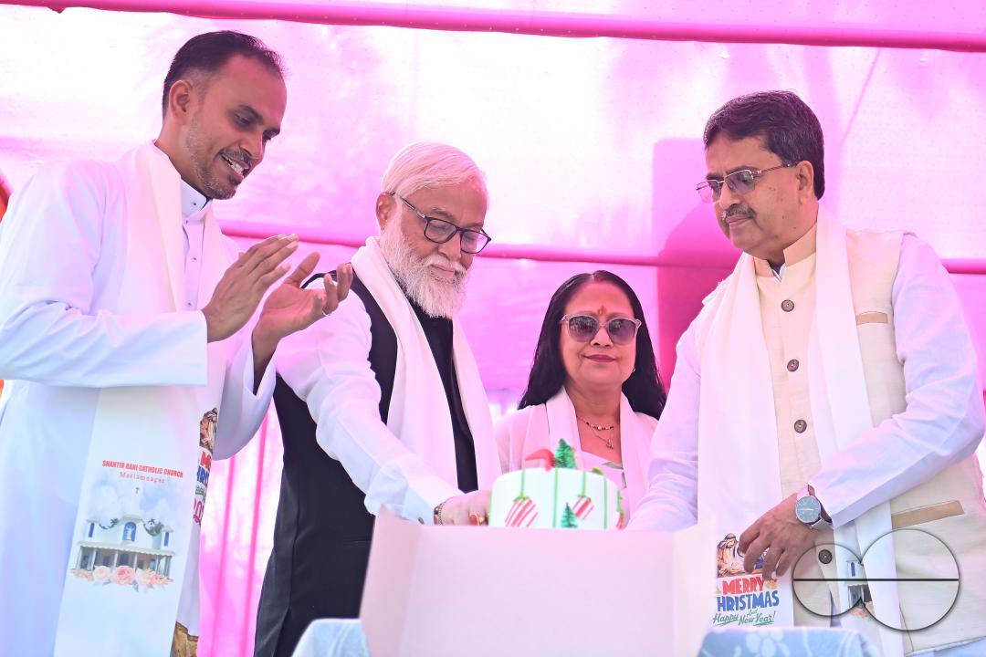 Tripura chief minister Manik Saha cutting the Christmas cake at Mariam Nagar Church in Agartala