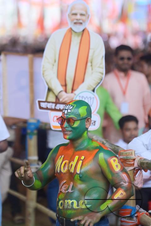 Supporters of the BJP at a rally of Prime Minister Narendra Modi ahead of the Lok Sabha Election in Agartala