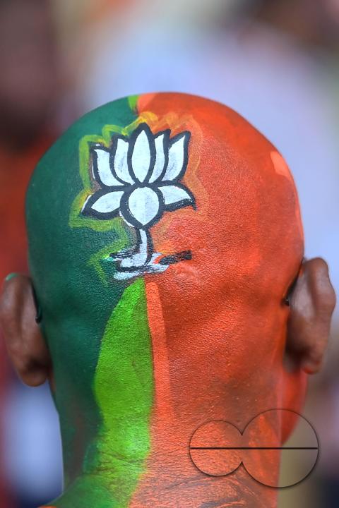 Supporters of the BJP at a rally of Prime Minister Narendra Modi ahead of the Lok Sabha Election in Agartala