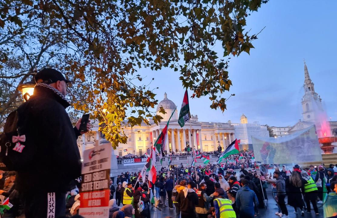 Thousands of protestors raise voices, carry placards and show their support for Palestinians, at Trafalgar Square, central London