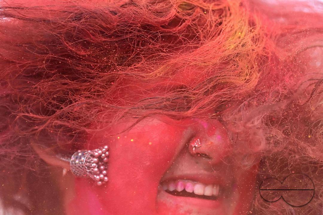 Indian girls adorned with 'Gulal' or coloured powder during the Hindu spring festival 'Holi', the festival of colour in Agartala
