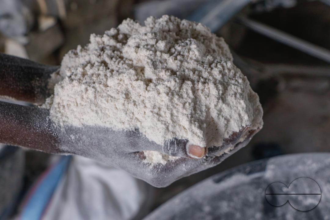 Females in Abuja are struggling and making strides in a local cassava processing factory under difficult conditions to produce flour as they wash out chaff from fermented cassava