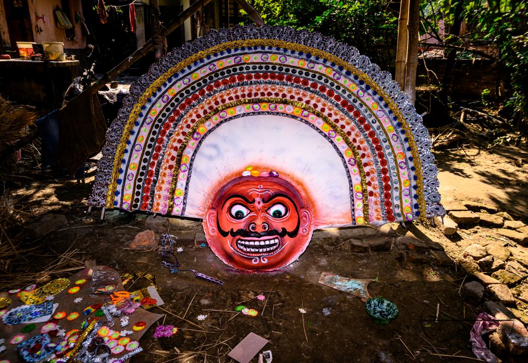 A village idol artist makes large color masks modeled after Purulia Chhau dance masks (Purulia Chhau dance is listed on UNESCO's World Heritage list of dances) of goddesses, animals, and rakshasas (humanoid demons or unrighteous spirits) like Hindu mytho