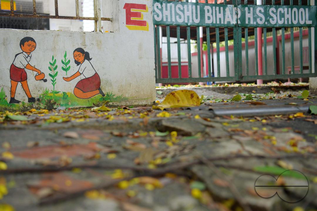 A locked gate of a government school during cyclone MidhiliÂ in Agartala