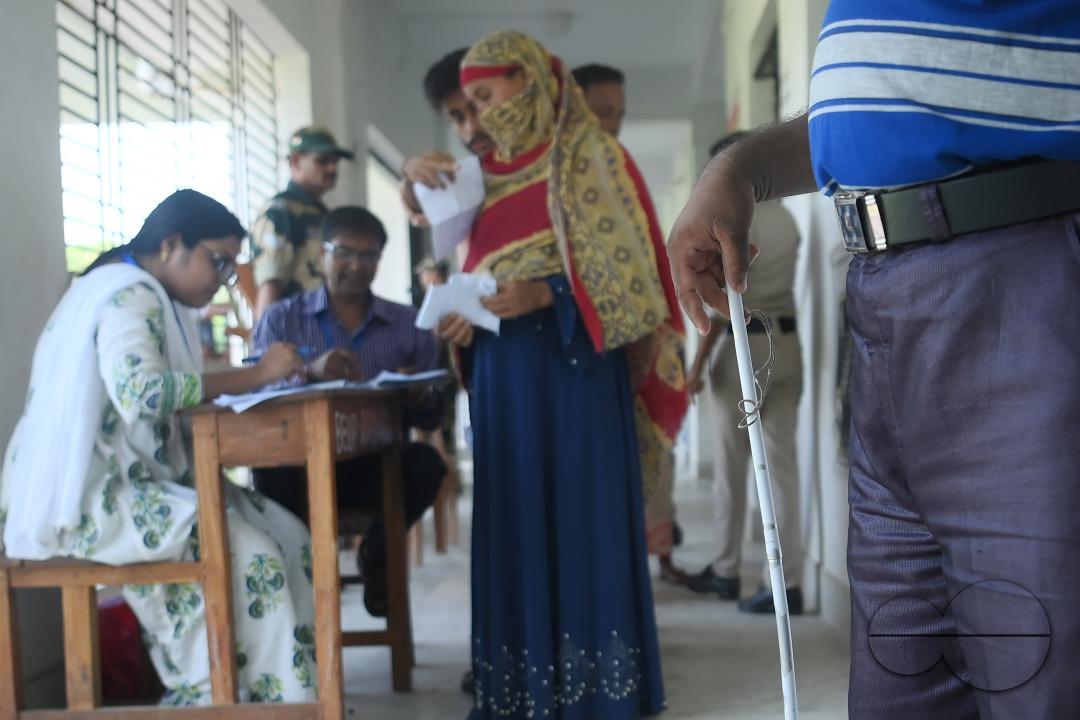 A blind voter at the by-elections for the Boxonagar assembly seat, in Tripura Sepahijala district