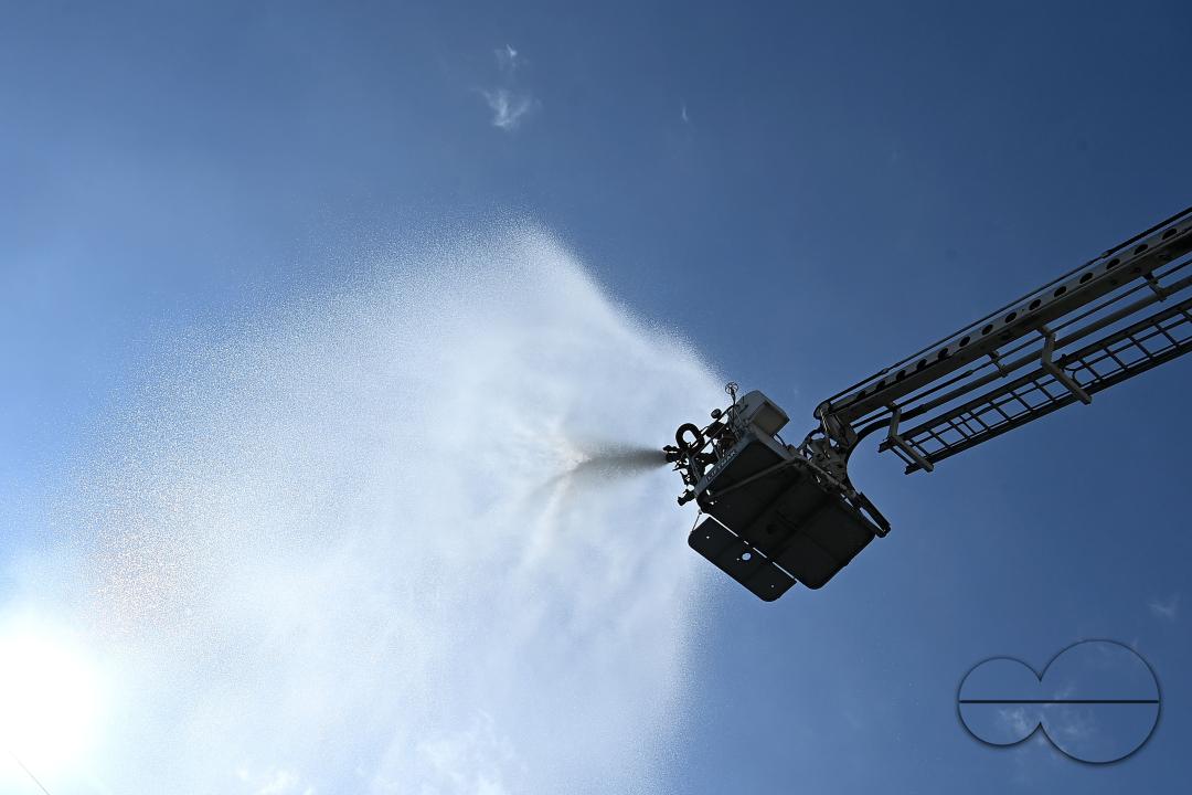 Fire brigade personnel are trying to control a fire on the top of the building of the dental college during a state level mock exercise on earthquake day at Agartala