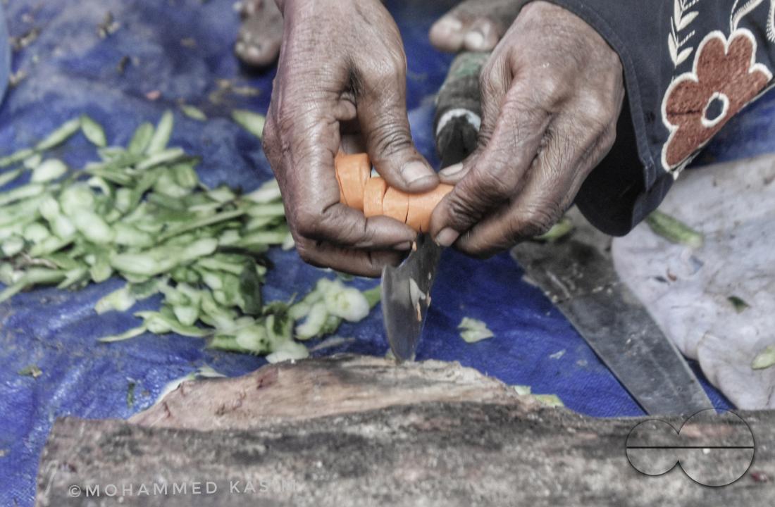A woman cooking at the Balukhali refugee camp