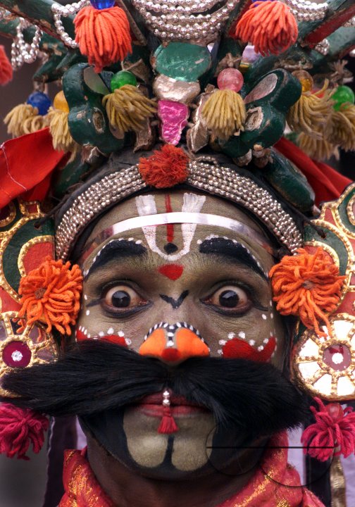 A South Indian dancer performs during a stage show at a dance festival in Kolkata, India
