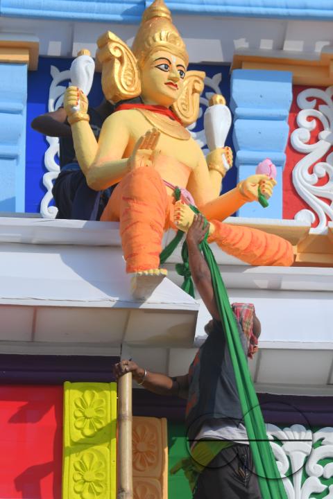Workers are doing the final touches to a pandal to worship Goddess Kali on the eve of Diwali, the festival of light and crackers in Agartala