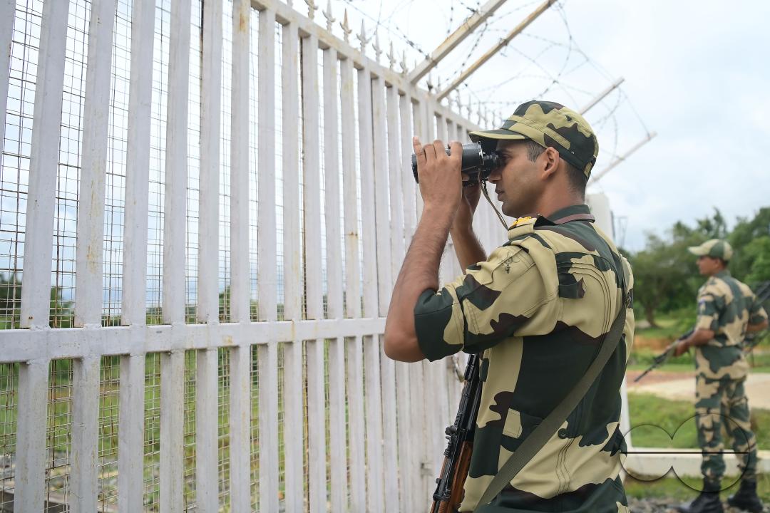 Security personals of the Border Security Force (BSF) providing tight security and patrolling the India- Bangladesh rail line in Nischinta Pur area, in precaution to the ongoing anti-quota protests in neighbouring country Bangladesh