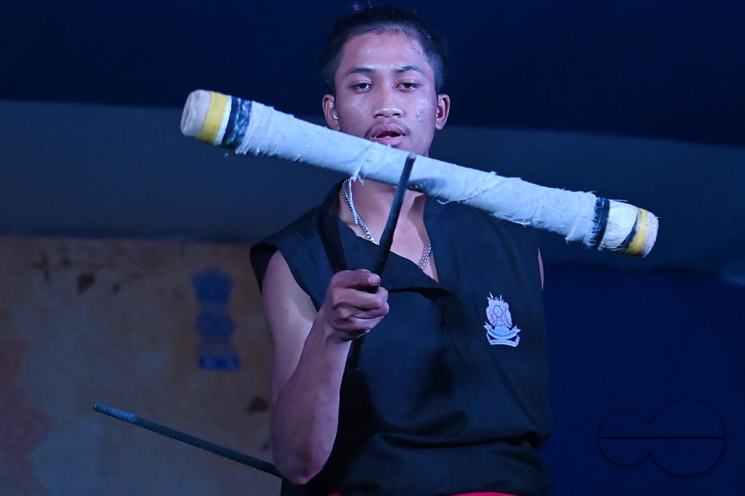 Manipuri martial arts students performing at the opening program of the 225th Raas Festival in Radha madhab Mandir at Agartala