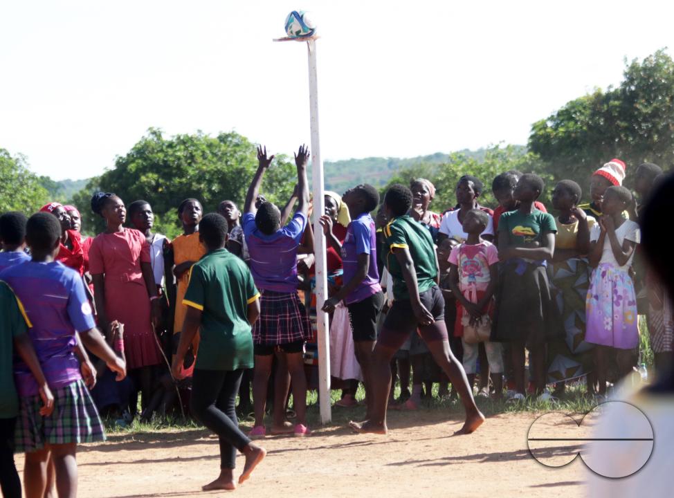 Women play netball at a tournament in Mzimba District, Malawi.