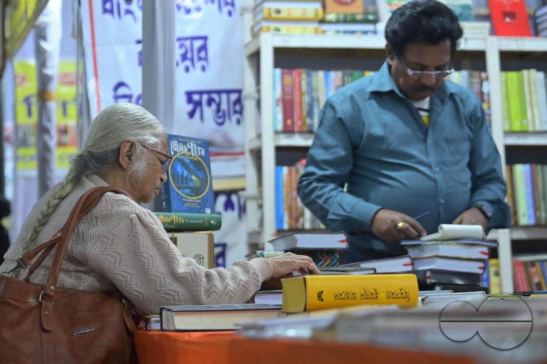 People looking at books in a book stall at the 42nd Agartala Book fair International Fair Ground, Hapania at Agartala