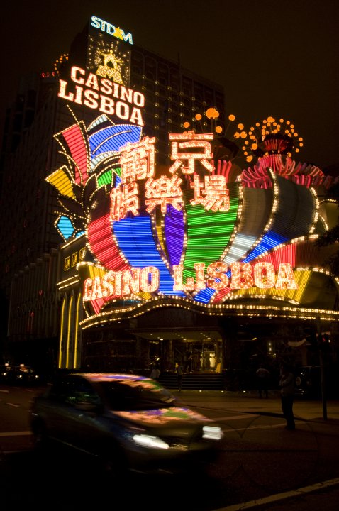 CHINA Neon lights of the old Lisboa casino in Macau.