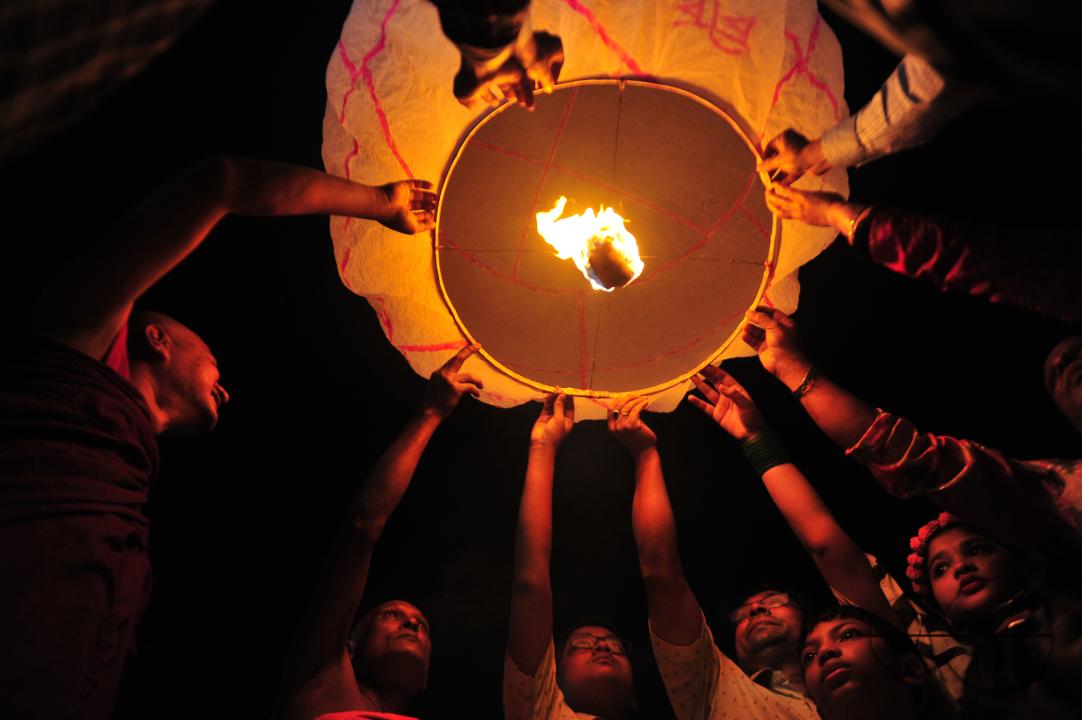 Buddhists religious followers are lighting fire sparks to celebrate Prabarana Purnima 2023 at Buddhist temples in Sylhet