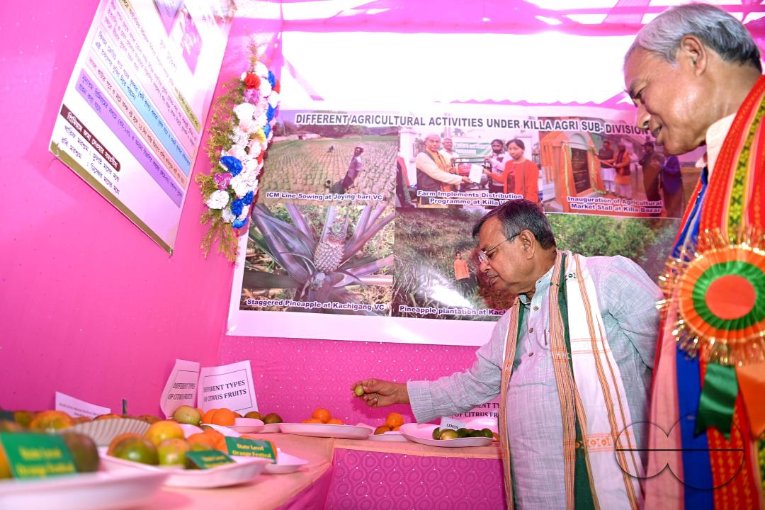 Minister for Agriculture and Farmers Welfare, Ratan Lal Nath inspects oranges during the Orange Festival in Taibaglai Village (Killa) organized by the Agriculture and Farmers Welfare of Tripura