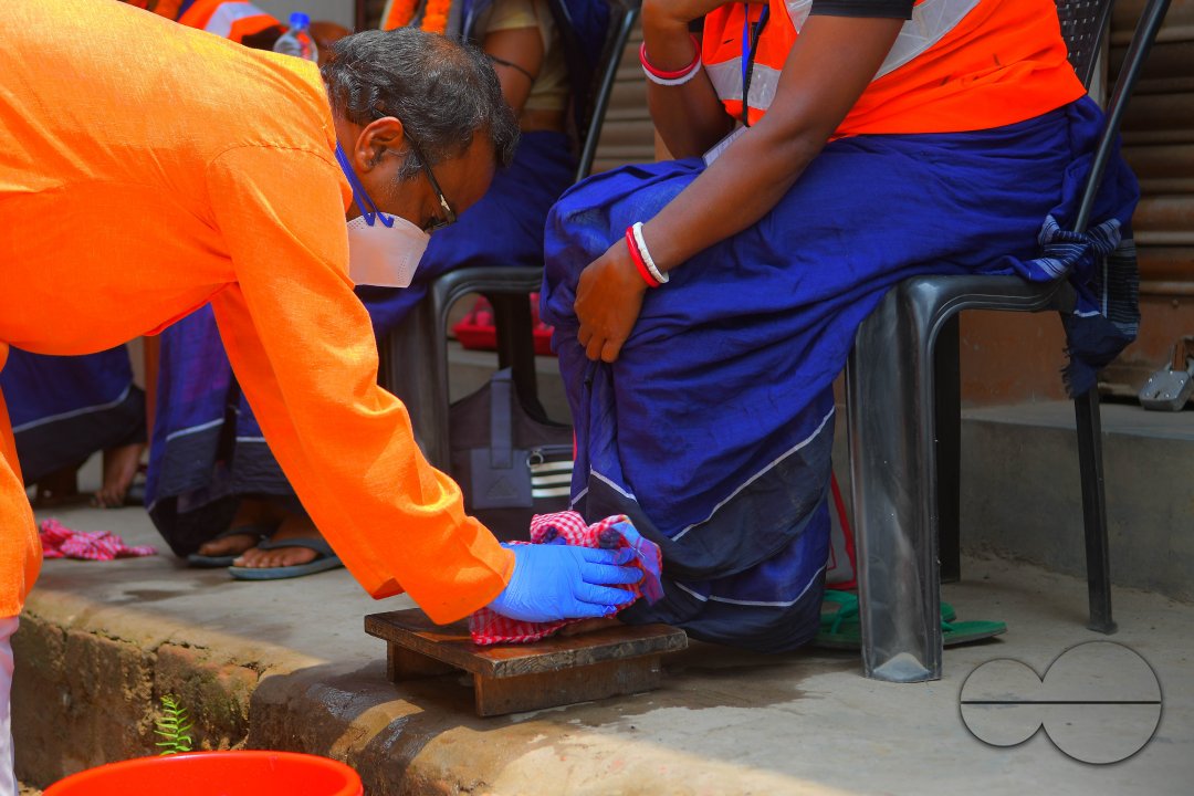 Cleaning the feet of safari workers (Cleaning Staff)