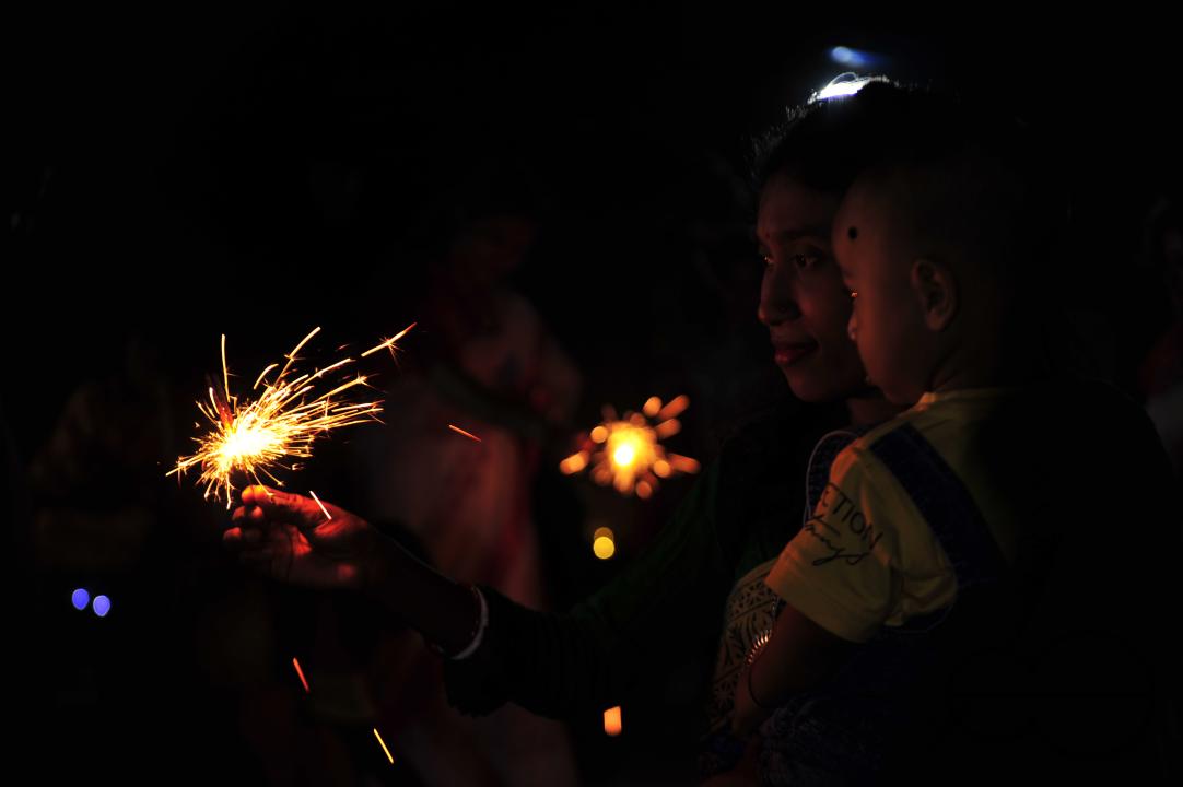 Buddhists religious followers are lighting fire sparks to celebrate Prabarana Purnima 2023 at Buddhist temples in Sylhet